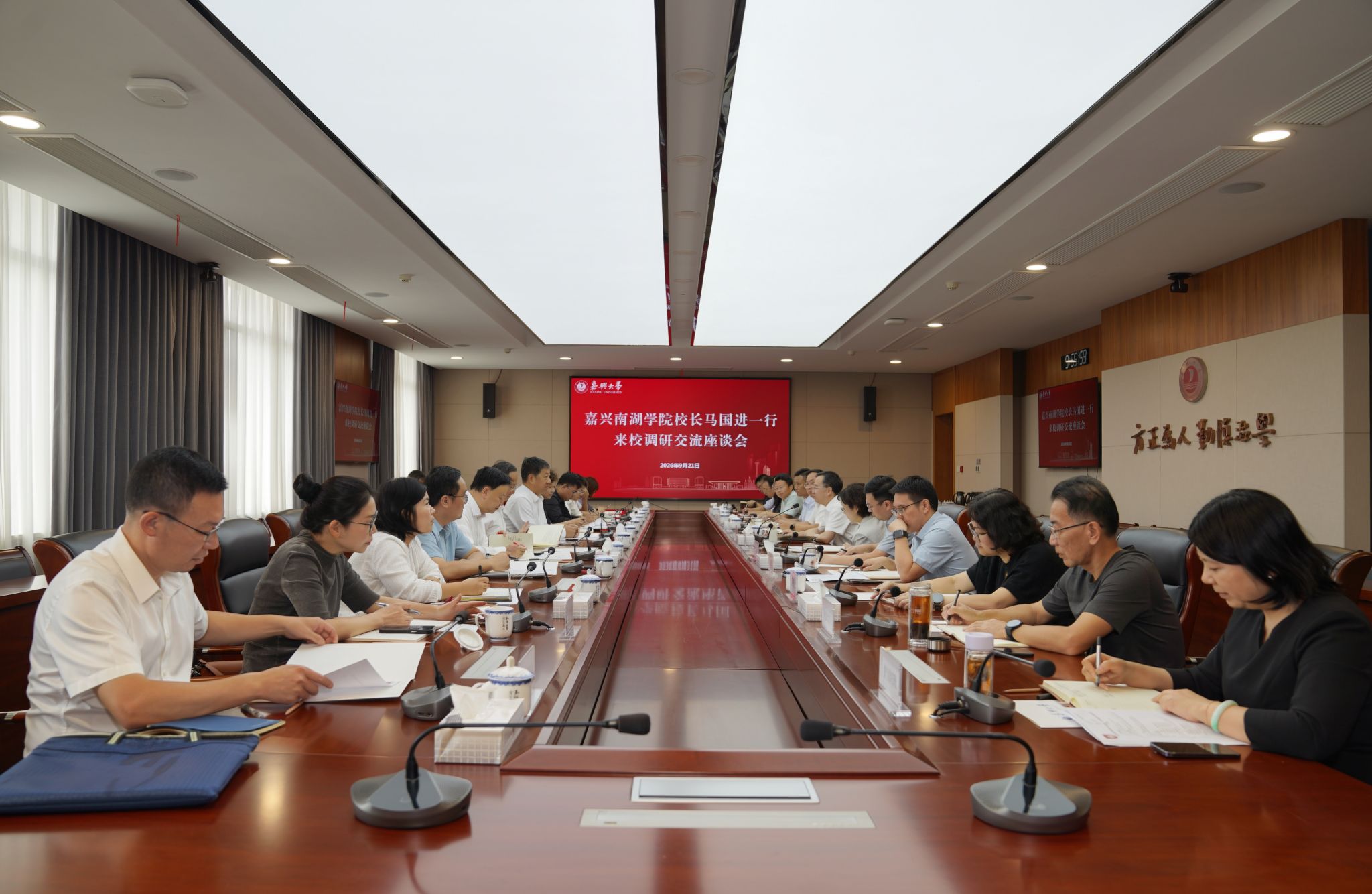 嘉兴南湖学院校长马国进带队赴嘉兴大学调研交流
